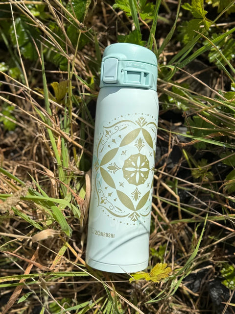 Zojirushi SM-SG48 Mint travel mug stainless steel insulated bottle on grass in Ireland