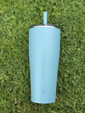 zojirushi aqua green straw tumbler on the grass